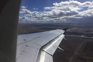 View out of an airplane window over USA